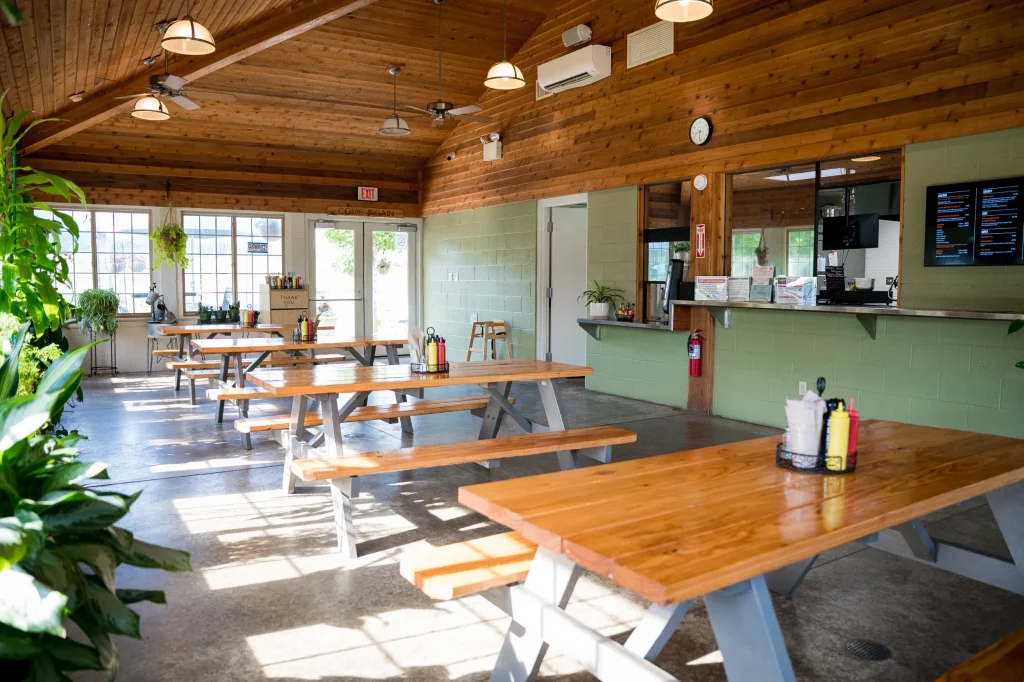 Kickapoo Adventures Bar and Grill interior with tables